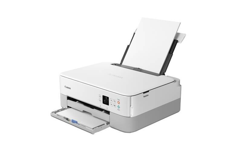 Tlačiareň Canon s papierom na skenovanie a tlač dokumentov.
